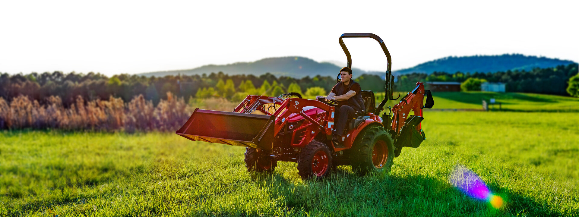 Close-up of a Kubota machine with visible branding and mechanical parts